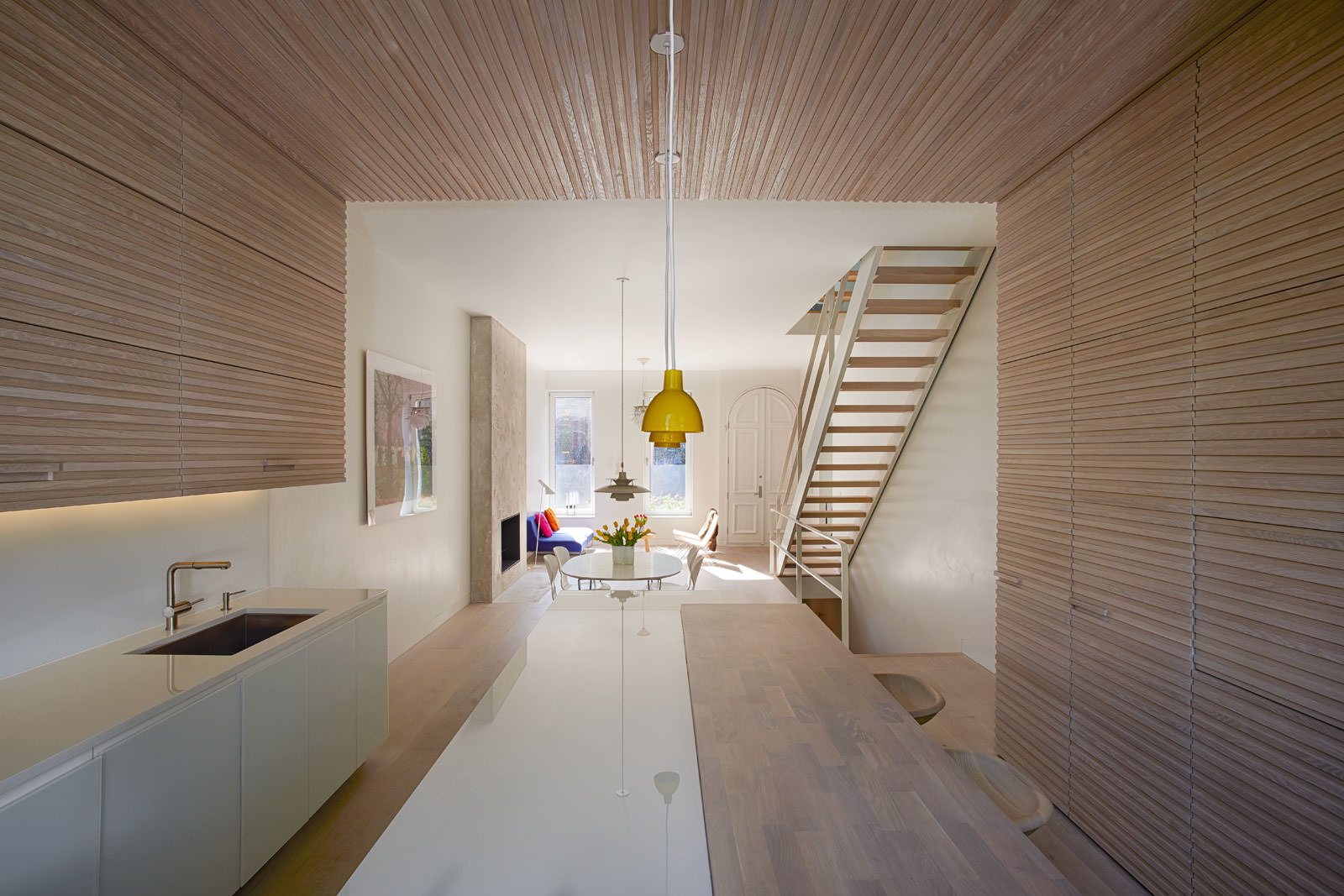 Gorgeous slatted wood kitchen in Park Slope passive house design and renovation.