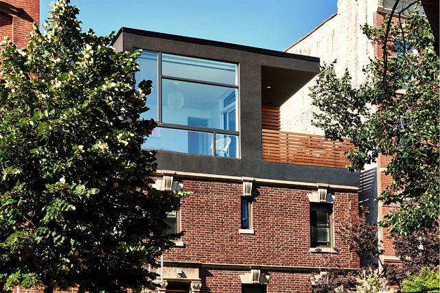 Brooklyn townhouse renovation with sleek, airy rooftop addition.