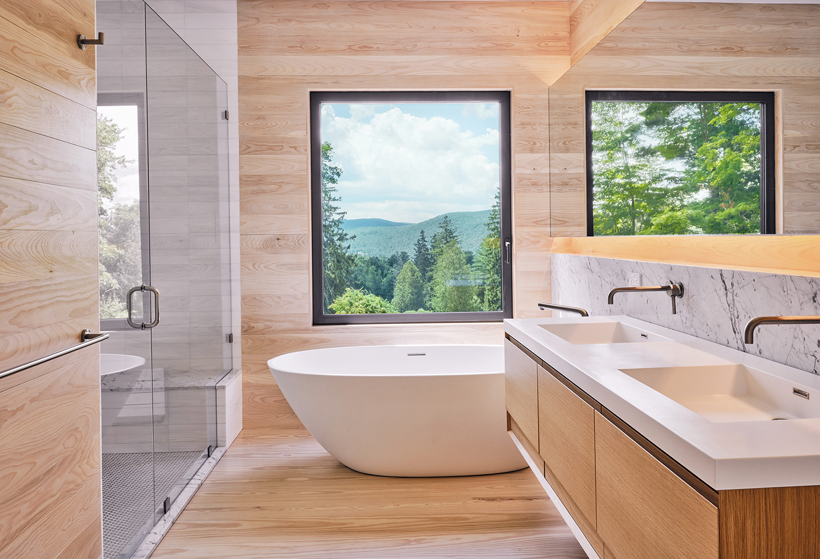 bathroom photo from passive house interior design project with window view looking out to mountains