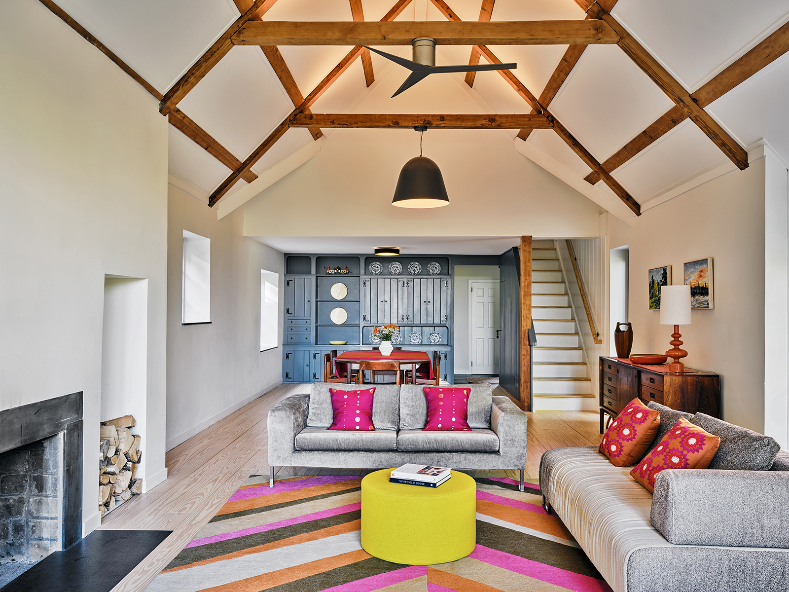 interior living room photo from modern passive home. colorful rug rug and pillow decor accents