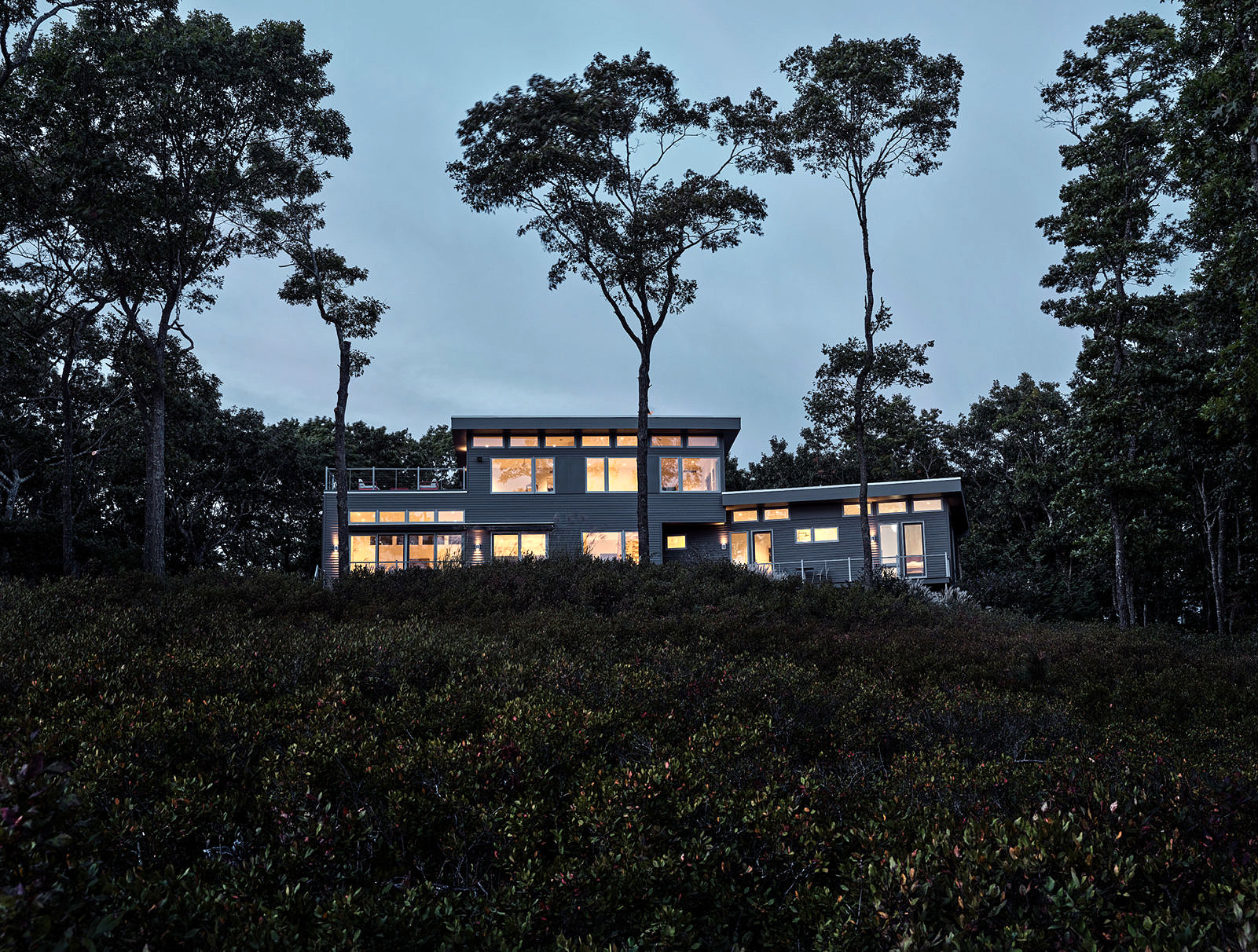 nighttime view of front of Sarah Jeffrys new architectural build in Charlestown Rhode Island